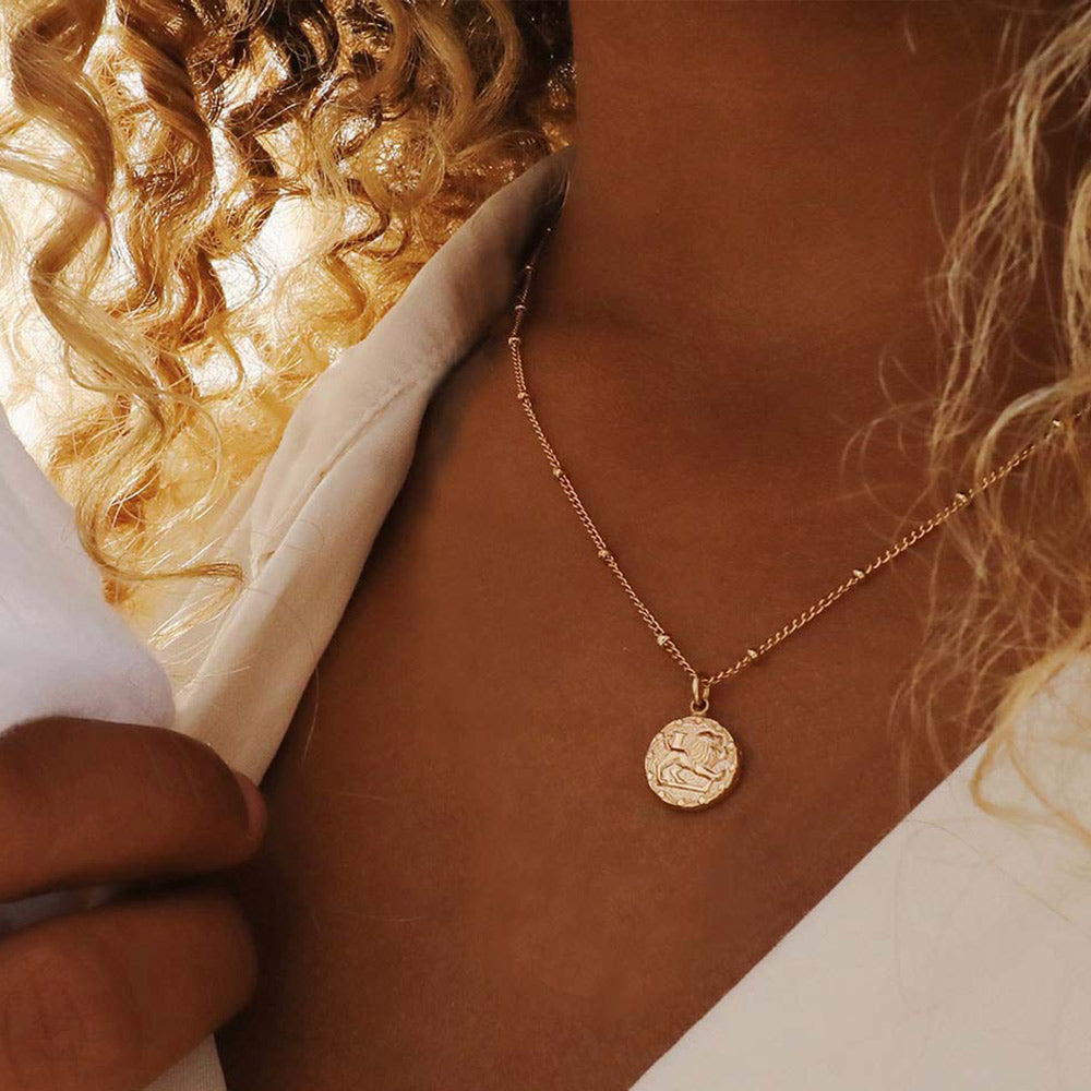 Collier or signe astro