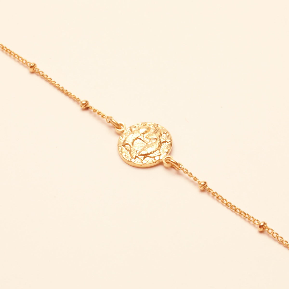 Collier ajustable signe astrologique poisson or rose