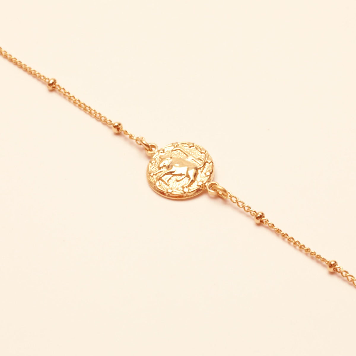 Collier ajustable signe astrologique taureau or rose
