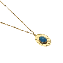 Collier doré ovale martelé pierre turquoise
