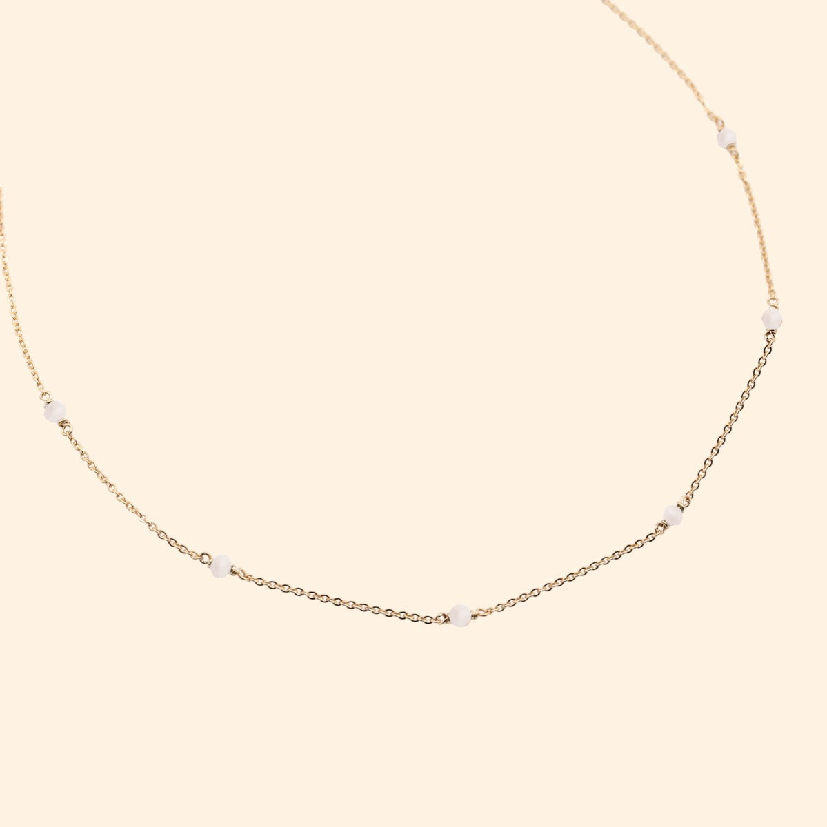 Collier or pierres quartz rose