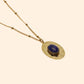 Collier doré ovale martelé pierre lapis lazuli