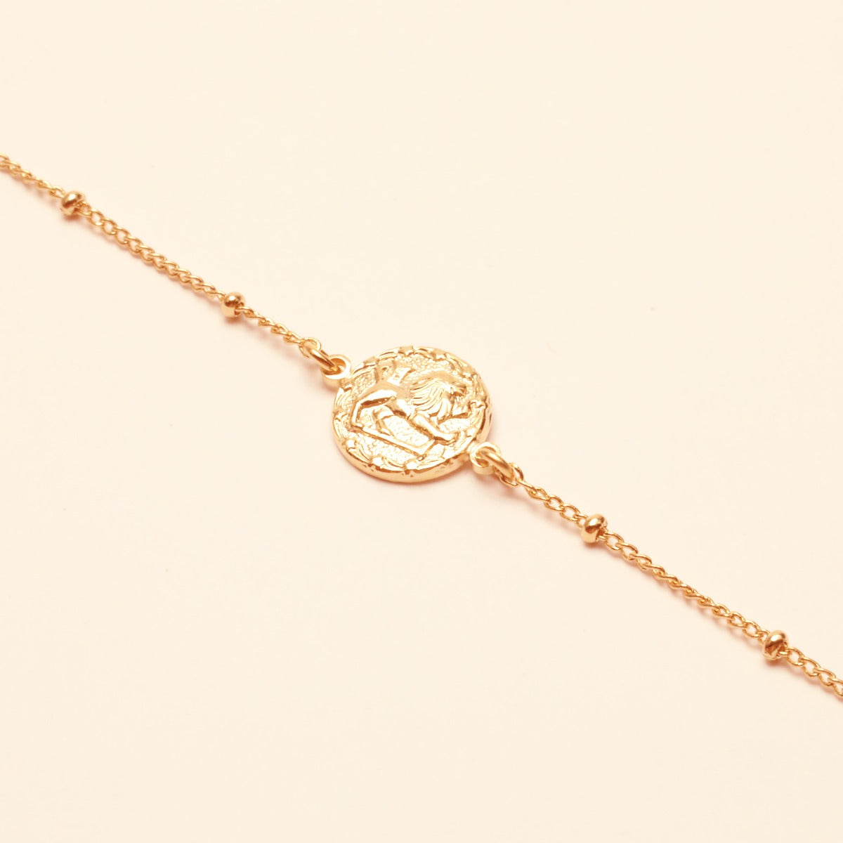 Collier ajustable signe astrologique lion or rose